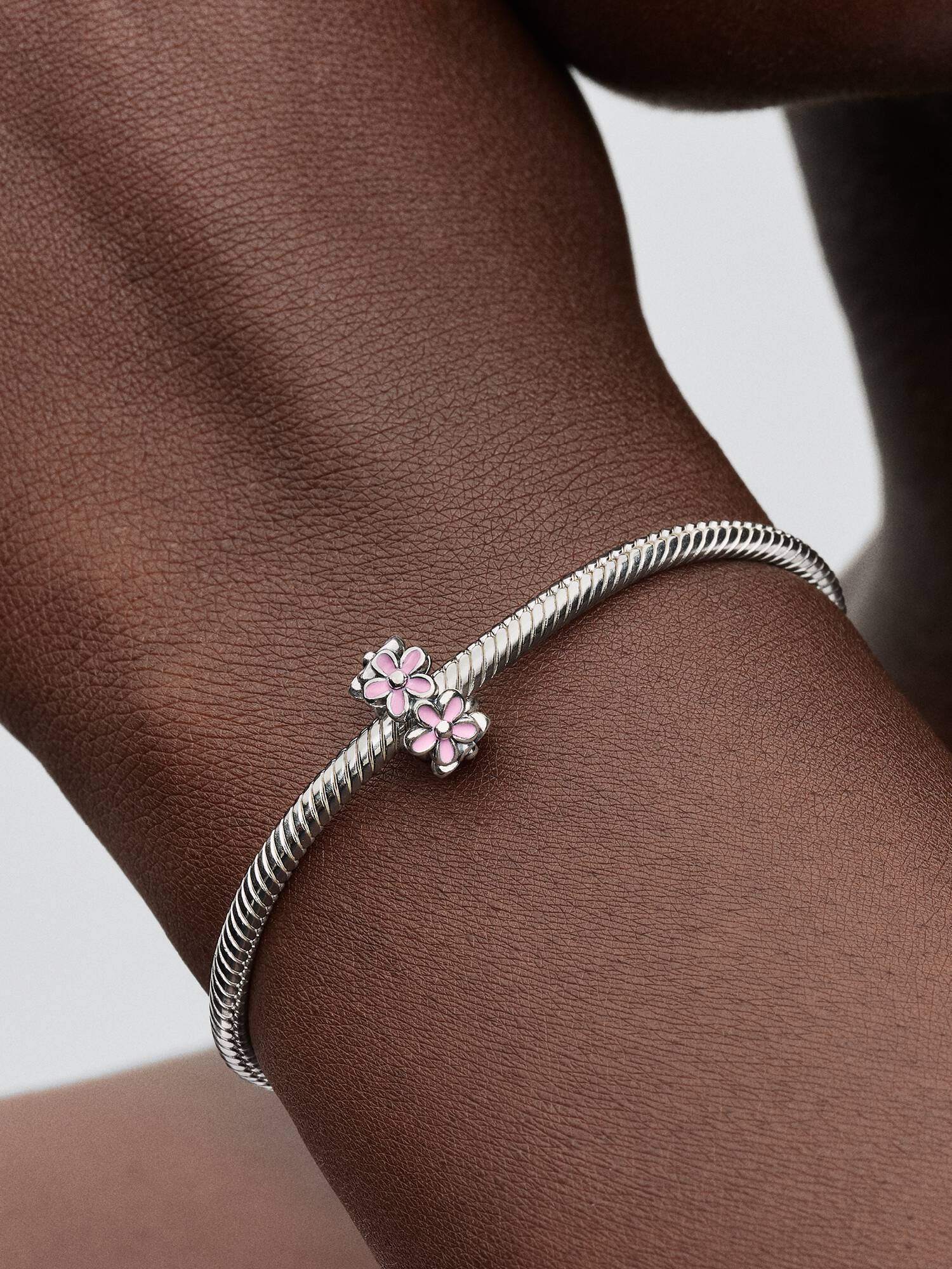 Mellanled med rosa tusensköna