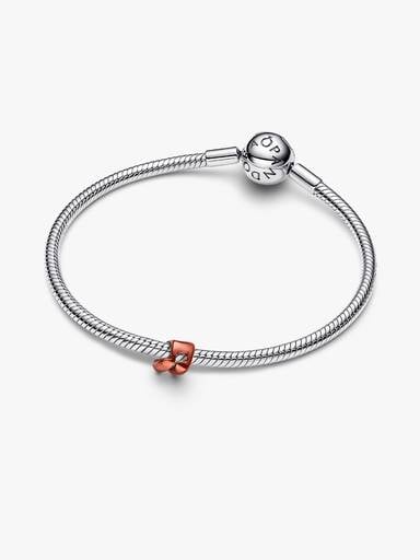 Orange miniberlock med musiknot